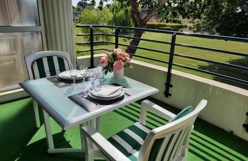 Saint-Andre-des-Eaux Apartment | Elegant Apartment at La Baule Golf with Pool & Family Perks