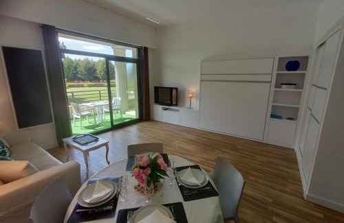 Saint-Andre-des-Eaux Apartment | Elegant Apartment at La Baule Golf with Pool & Family Perks