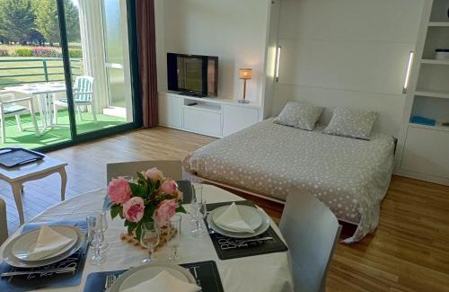 Saint-Andre-des-Eaux Apartment | Elegant Apartment at La Baule Golf with Pool & Family Perks