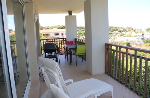 Marine de Saint Ambroggio Apartment | Airy Oceanview Apartment Steps from the Beach with Spa