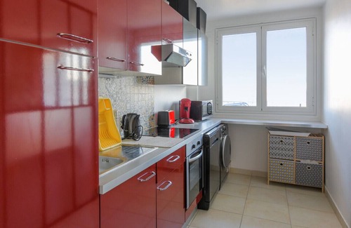 Clichy Apartment | Inviting Retreat with Balcony and Seine River Views