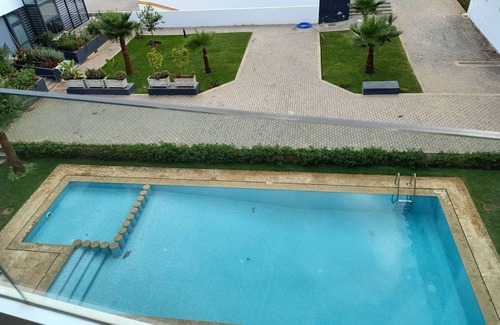 Harhoura Apartment | Beachfront Apartment with Pool and Family-Friendly Amenities