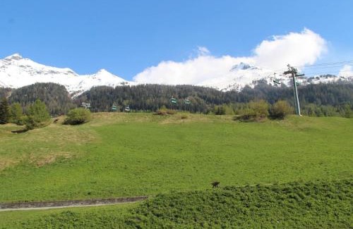Lanslevillard Apartment | Cozy Apartment for 4 with South-Facing Balcony in Val Cenis