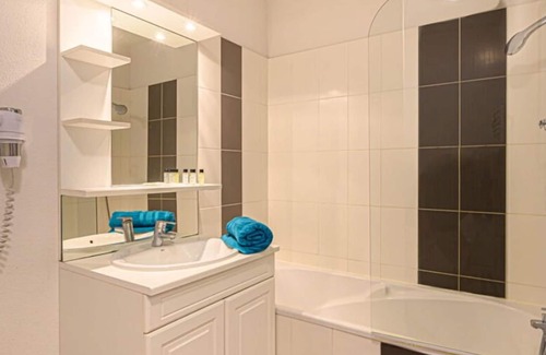 Plescop Condo | Spacious Apartment with Pool Access and Family Amenities
