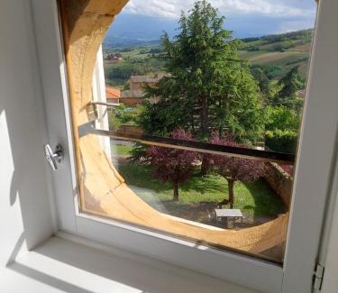 Theize House | Book Your Stay at Appartement Theizé - Family-Friendly Retreat