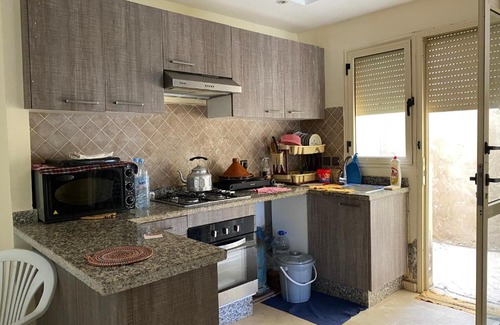Kceibya Apartment | Relaxing Poolside Retreat at Savannah Beach Apartment