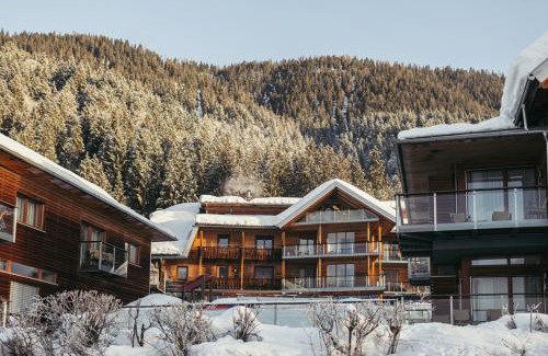 Neusach Apartment | Discover Appartementhotel am Weissensee with Oceanfront Bliss