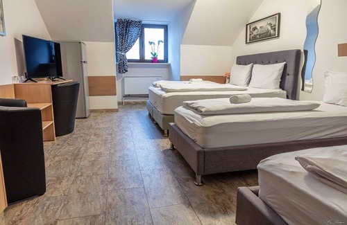 Neuhaus am Inn Hotel | Discover Apparthotel Alte Innbruecke: Family-Friendly Escape