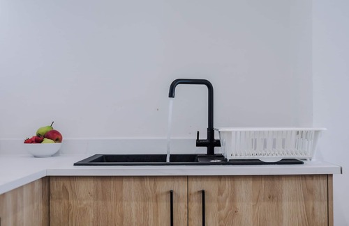 Trafford Apartment | Modern Flat in Town with Kitchen & Family-Friendly Perks