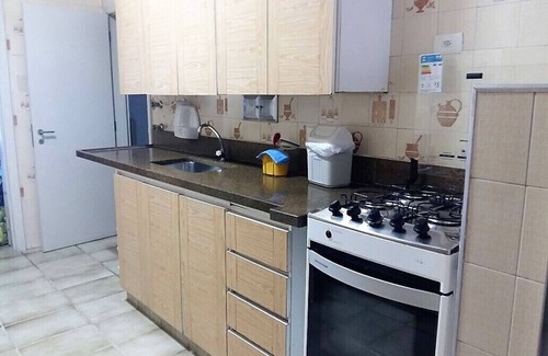 Centro Apartment | Beachfront Apt. Guarujá: Pet-Friendly & 9.8 Rated Escape