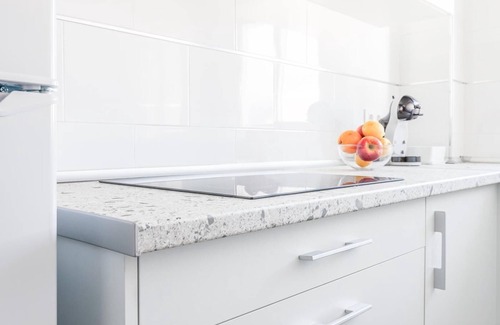 La Algaba Apartment | Inviting 2 BR Algaba Apartment with Spa & Kitchen Amenities
