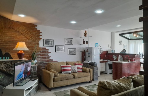 Urca Apartment | Experience Urca's Best with Ocean View & Hot Tub Access
