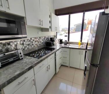 Ciudad Cariari Apartment | Budget-Friendly Stay at Apartamento Morpho Aeropuerto