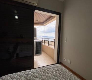 Vila Alzira Apartment | Cozy Apt in Guarujá: Steps from Asturias Beach & Pool
