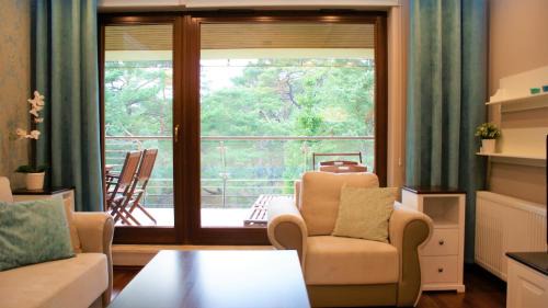 Jurata Apartment | Discover Apt Perlowy - Oceanfront Retreat with 9.7 Rating