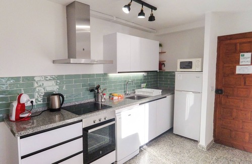 La Herradura Apartment | Beachfront Apt Poniente: Terrace with Ocean Views & Pool