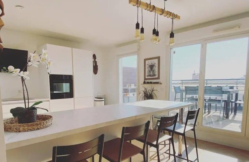 La Belle de Mai Apartment | Inviting Rooftop Retreat with Ocean Views and Family Amenities