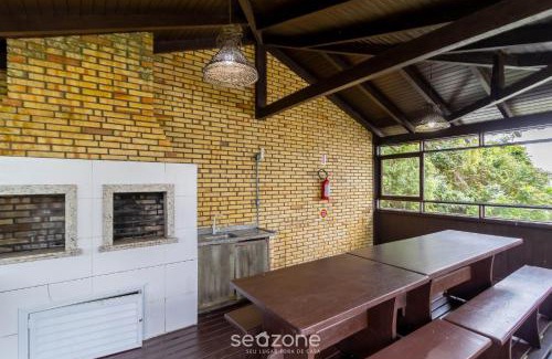Quatro Ilhas Apartment | Serene Ocean View Retreat in Bombinhas for Families