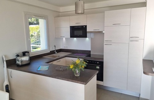 La Nartelle Apartment | Inviting Apartment with Pool and Ocean Views, Steps to Beach