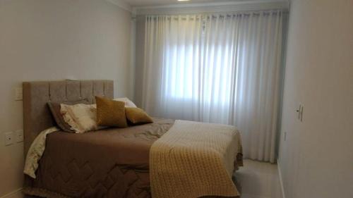 Torres Apartment | Prime Location: Apto Steps from the Beach in Torres