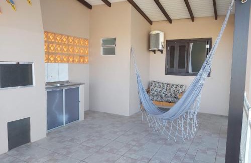 Arroio do Sal Apartment | Cozy Apartment with Covered Terrace for Family Getaways