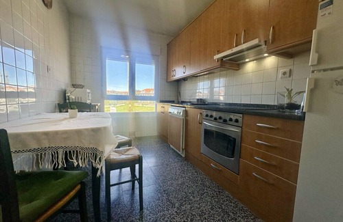 Noja Apartment | Relaxing Retreat at Los Girasoles: Garden & BBQ Included