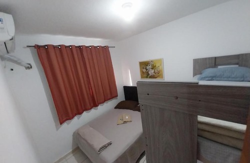 Campos Apartment | Budget-Friendly Apto Ester Onizz: Pet & Child Friendly Stay