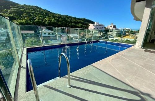 Bombas Apartment | Perfect Family Retreat: Apto Garden with 2 Suites in Bombinhas