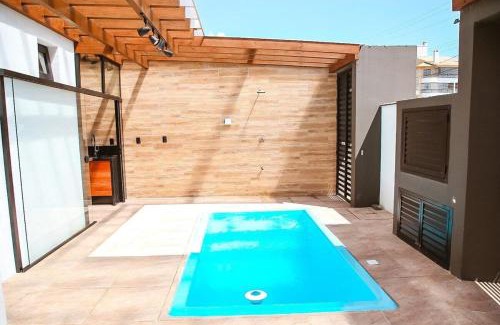 Centro Apartment | Serene Beachfront Apartment with Private Pool & Ocean Views
