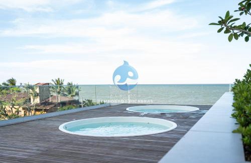 Itacolomi Apartment | Apto Pé na Areia Vista Mar Incrível Condo Resort Completo com Piscina Infinita, Beach Tennis, Academia, Sala de Jogos, Brinquedoteca, Playground e Portaria 24H 3 Quartos com Ar-Condicionado, Churrasqueira Privativa Reserve Agora e Viva essa Experiência