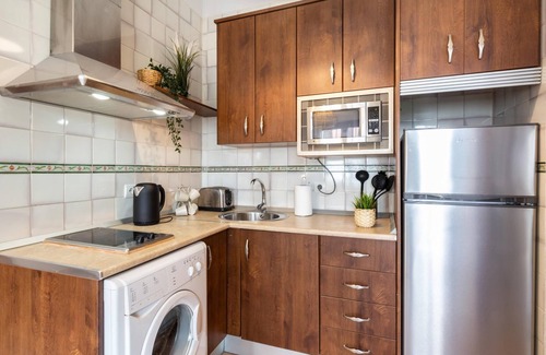 San Ildefonso Apartment | Cozy Apto Real Bajo Cartuja: Patio, Wi-Fi & Top Ratings
