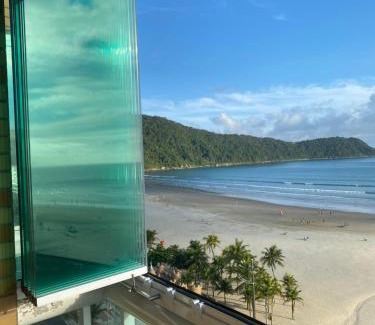 Canto do Forte Apartment | Oceanfront Apto Varanda Gourmet with Free Wi-Fi & Pets Welcome