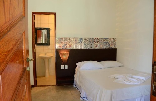 Ilha Grande Hotel | Relax at Aquário Pousada Hostel: Pool, Spa & Family Friendly