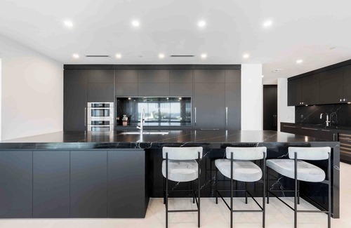Seven Mile Beach Condo | Aqua #2: Full-Floor Luxury Condo on 7Mile Beach w/Oceanfront Terrace, Private Hot Tub, & Communal Pool.