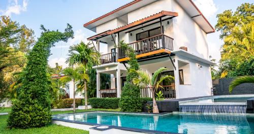 Wok Tum Apartment | Family-Friendly Aqua Suites with Pool and High Guest Ratings