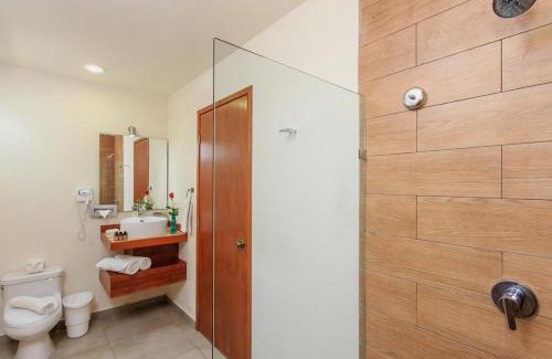 Majahual Hotel | Relax at Aquastar Hotel & Apartments with Oceanfront Bliss
