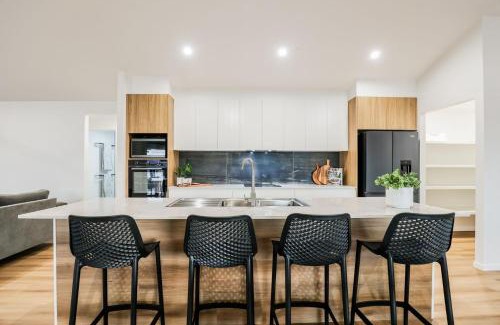 Agnes Water House | Relax at Aquatic Abode: Oceanfront Poolside Retreat