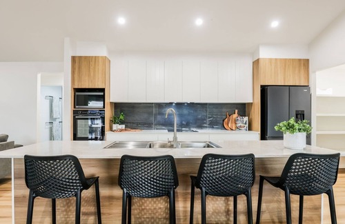 Agnes Water House | Aquatic Abode: New 4 Bedroom with Pool & Ocean View