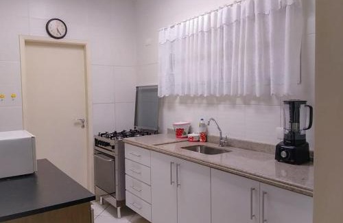 Jardim Vitoria Apartment | Prime Location in Guarujá - Steps from the Beach & Shopping