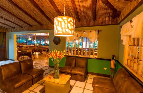 Puerto Viejo de Sarapiqui Hotel | Discover Ara Ambigua Lodge: Pool, Spa & Family-Friendly Stay