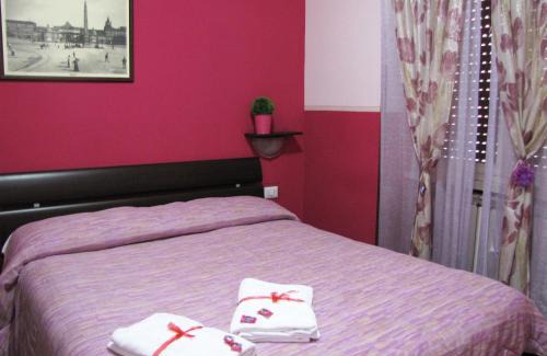 Tuscolano Bed & Breakfast | Budget-Friendly Aracoeli: Family Rooms with Kitchen Access