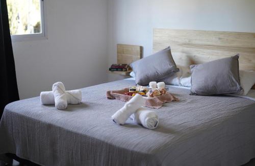 San Miguel del Monte Apartment | Discover Araucarias Cabañas: Family-Friendly with Pool