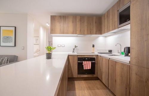 Apoquindo Apartment | Arauco Vibe 2BR Kennedy - BBQ and Aqua Gym!