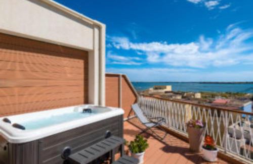 Syracuse Apartment | Discover Archinuè: Family-Friendly with Hot Tub & Kitchen