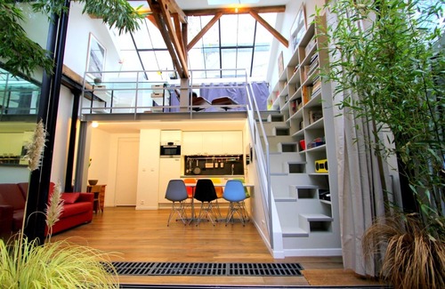 3rd Arrondissement Apartment | Stylish Duplex Loft in Historic Marais with Pool Access