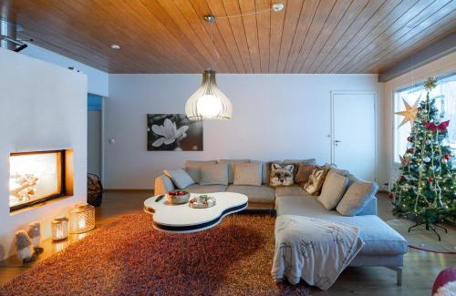 Rovaniemi Villa | Idyllic Arctic River House with Oceanfront Views & Family Friendly