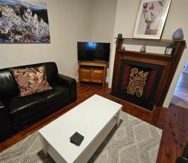 Orange House | Discover Arden on McLachlan: Pet-Friendly Retreat with Hot Tub