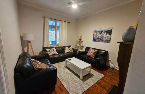 Orange House | Discover Arden on McLachlan: Pet-Friendly Retreat with Hot Tub