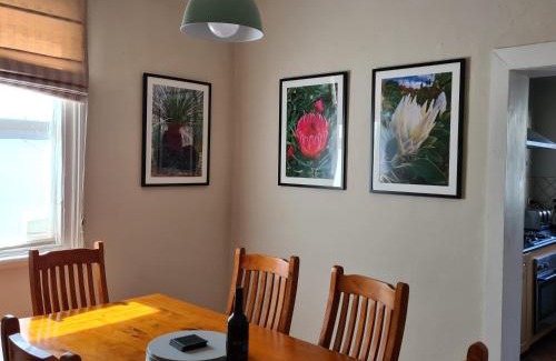 Orange House | Discover Arden on McLachlan: Pet-Friendly Retreat with Hot Tub