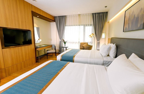 South Triangle Hotel | Top-Rated Ardenhills Suites with Pool and Spa Amenities